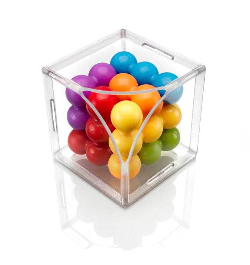 Cube Puzzler Pro, a 3D packing problem with ball shaped puzzle pieces